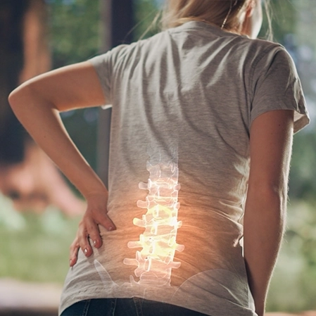Chiropractic Osseo MN Woman With Back Pain